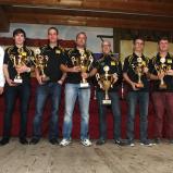 Die Sieger des ADAC OPEL Rallye Cup 2013: (v.l.) Jörg Schrott (Opel Motorsport Direktor), Marijan Griebel, Alex Rath, Markus Fahrner, Michael Wenzel, Fabian Kreim, Marvin Engel, Hermann Tomczyk (ADAC Sportpräsident)